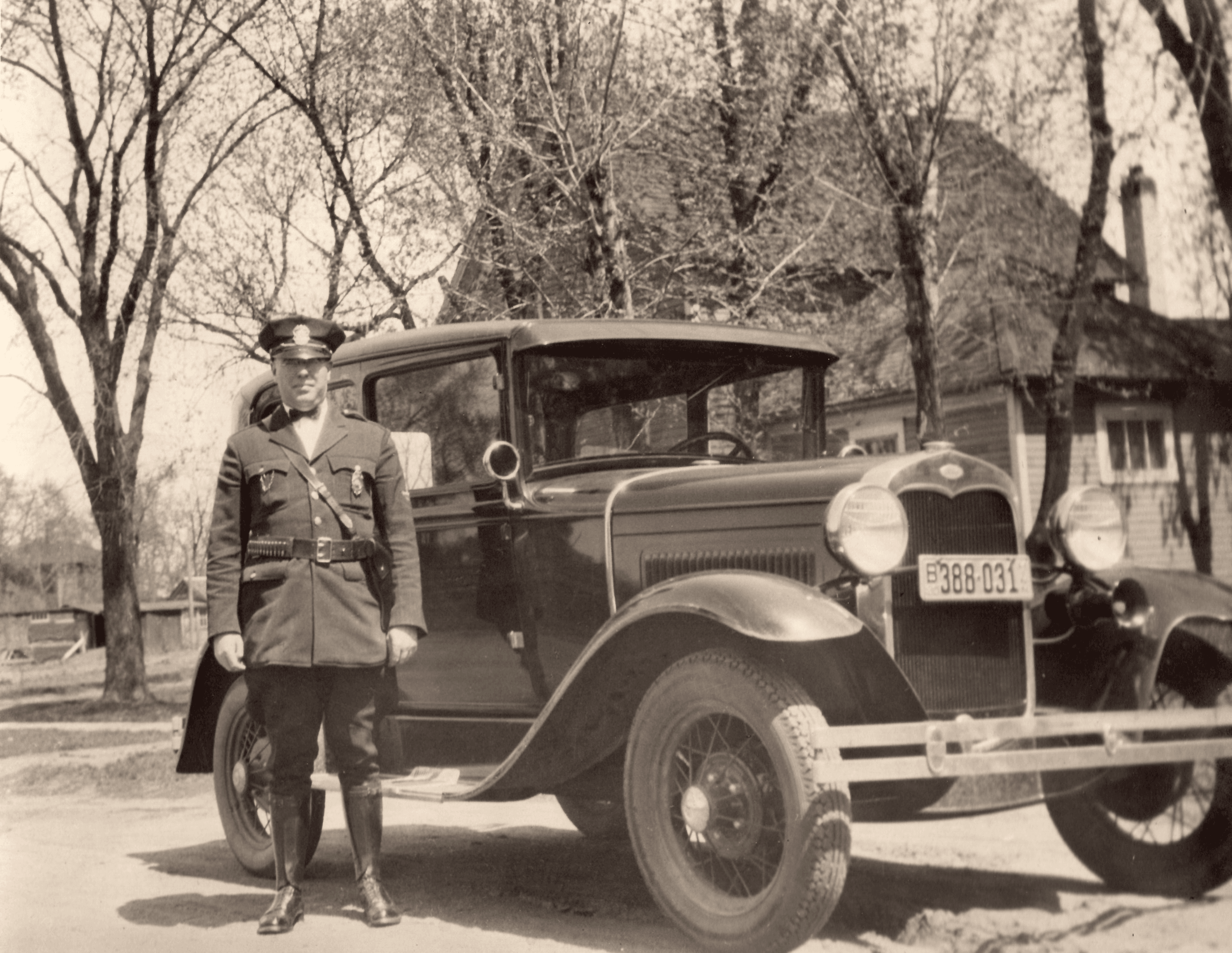 Police Officer with 1935 Ford Squad Car